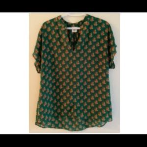 Green blouse with floral print